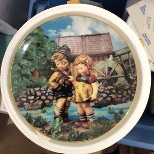 M.J. Hummel Little Companions Plate collection.